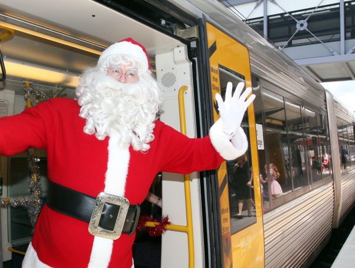 Santa arriving on the Santa Express at Richlands Station. Photo: Inga Williams / The Satellite Santa arriving on the Santa Express at Richlands Station. Photo: Inga Williams / The Satellite