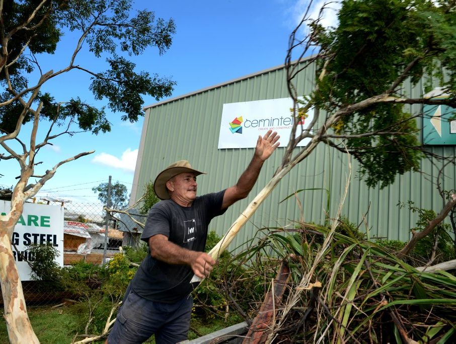 David Millar clears some trees after the storm in Tweed Heads South on Tuesday. David Millar clears some trees after the storm in Tweed Heads South on Tuesday.