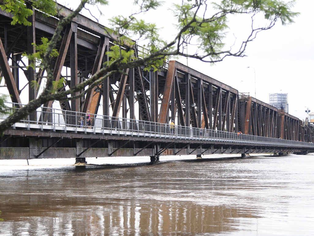 Floodwater runs high under the Grafton Bridge. Photo: JoJo Newby Floodwater runs high under the Grafton Bridge. Photo: JoJo Newby