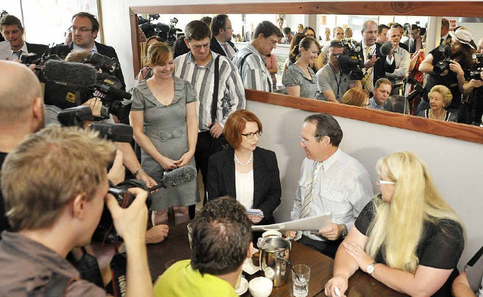 CIRCUS ROLLS IN: The press pack and Prime Minister Julia Gillard crowd into the Cactus Espresso Bar yesterday. CIRCUS ROLLS IN: The press pack and Prime Minister Julia Gillard crowd into the Cactus Espresso Bar yesterday.