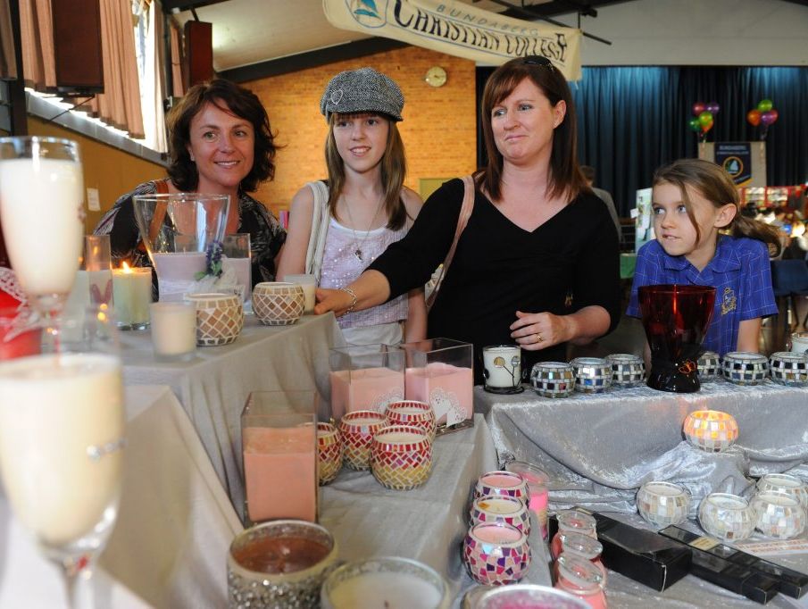 SCENTED CANDLES: Michelle Thomas, Ashlyn Howse, Tammy Howse and Hannah Howse look at the selection of scented candles for sale at the Sew What's Crafty Expo. Photo: Mike Knott / NewsMail SCENTED CANDLES: Michelle Thomas, Ashlyn Howse, Tammy Howse and Hannah Howse look at the selection of scented candles for sale at the Sew What's Crafty Expo. Photo: Mike Knott / NewsMail