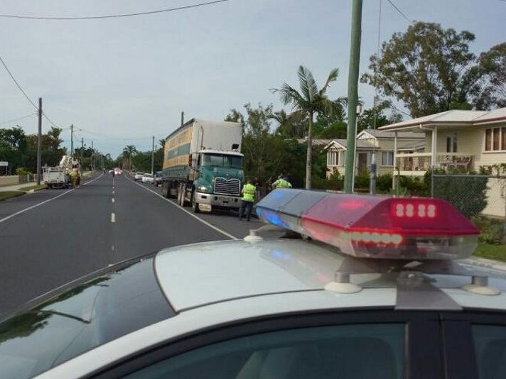 Police and Ergon Energy workers are at the scene of a truck crash which brought down power lines on Alice St in Maryorough. Police and Ergon Energy workers are at the scene of a truck crash which brought down power lines on Alice St in Maryorough.