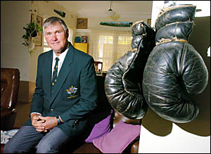 Athol McQueen tries on his 1964 Olympic blazer and even gets out a pair of gloves he used more than 40 years ago. Athol McQueen tries on his 1964 Olympic blazer and even gets out a pair of gloves he used more than 40 years ago.