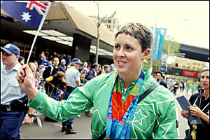 Mullumbimby?s triple gold medal-winning swimmer Petria Thomas leads yesterday?s Welcome Home Parade in Sydney. Mullumbimby?s triple gold medal-winning swimmer Petria Thomas leads yesterday?s Welcome Home Parade in Sydney.