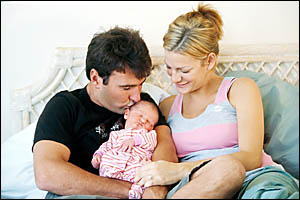 PROFESSIONAL surfer Joel Parkinson with his partner Monica Pagano and their baby daughter Evie soon after her birth PROFESSIONAL surfer Joel Parkinson with his partner Monica Pagano and their baby daughter Evie soon after her birth
