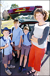 MORE FUNDS PLEASE: Leonie and her sons Andrew, 8, left, Patrick, 12, centre, and Thomas, 10. MORE FUNDS PLEASE: Leonie and her sons Andrew, 8, left, Patrick, 12, centre, and Thomas, 10.