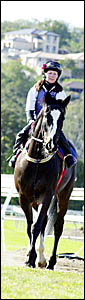 TRACKTEST: Right, Leeann Olsen guides Ears Ronny on to the Lismore track early yesterday morning. TRACKTEST: Right, Leeann Olsen guides Ears Ronny on to the Lismore track early yesterday morning.