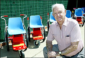 WHEELY GOOD: Tugun resident Jim Bullen with wheelchairs he made for the Rotary Wheelchair Program WHEELY GOOD: Tugun resident Jim Bullen with wheelchairs he made for the Rotary Wheelchair Program