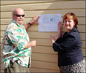 Paul McCarthy with community centre manager, Cassandra Parkinson, with a drawing of where the murals will be placed Paul McCarthy with community centre manager, Cassandra Parkinson, with a drawing of where the murals will be placed