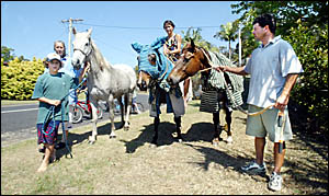 ROUNDING up their three horses are Leanne, Zac, Mahli and Dwayne Breckenridge ROUNDING up their three horses are Leanne, Zac, Mahli and Dwayne Breckenridge