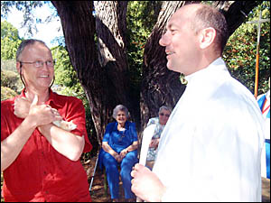 Father Trickey is pictured blessing Snoopy, held by its owner, Hylke Woldendorp. Father Trickey is pictured blessing Snoopy, held by its owner, Hylke Woldendorp.
