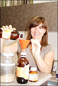 Sally McCutcheon dispenses herbal remedies for inflammatory arthritic conditions at her Ballina practice yesterday. Sally McCutcheon dispenses herbal remedies for inflammatory arthritic conditions at her Ballina practice yesterday.