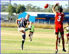 RG Gladstone Mudcrabs full-forward Adrian Murphy kicks one of his two goals against Yeppoon on Saturday. RG Gladstone Mudcrabs full-forward Adrian Murphy kicks one of his two goals against Yeppoon on Saturday.