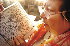 Julie Tuxford-Willmott looks over her manuscript which details her life including years as a Japanese prisoner of war. Julie Tuxford-Willmott looks over her manuscript which details her life including years as a Japanese prisoner of war.