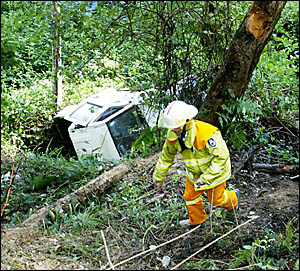 A WOMAN was lucky to escape this accident west of Uki. D92752d A WOMAN was lucky to escape this accident west of Uki. D92752d