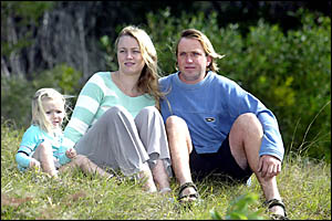 KALI Smith and Mark Pelka, with their daughter Natasha, sit on the land where they had hoped to build a home for their family. KALI Smith and Mark Pelka, with their daughter Natasha, sit on the land where they had hoped to build a home for their family.