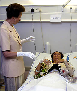 Louise Barry talks with Princess Anne during a visit to bomb victims at University College Hospital in London in Monday. Ms Bar Louise Barry talks with Princess Anne during a visit to bomb victims at University College Hospital in London in Monday. Ms Bar