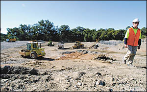 Looking like a giant-sized version of the ultimate children?s sandpit, the Englands Road tip site is full of men and machines p Looking like a giant-sized version of the ultimate children?s sandpit, the Englands Road tip site is full of men and machines p