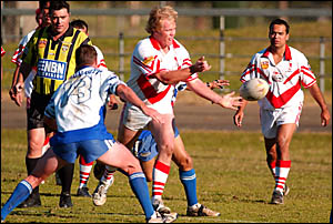 Rebels back-row forward Colby Schrader gets away a pass in yesterday?s local derby against the Grafton Ghosts. Rebels back-row forward Colby Schrader gets away a pass in yesterday?s local derby against the Grafton Ghosts.