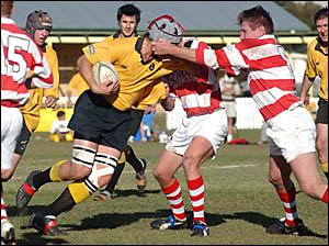 A Redmen forward appears to be adjusting the headgear of the Buccaneers ballrunner during Saturday?s rugby union local derby at A Redmen forward appears to be adjusting the headgear of the Buccaneers ballrunner during Saturday?s rugby union local derby at