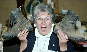JUNE Birkett of Crystal Creek with a pair of well-worn farm boots from her old-stuff display. June?s exhibit won first place in JUNE Birkett of Crystal Creek with a pair of well-worn farm boots from her old-stuff display. June?s exhibit won first place in