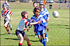 Valleys? Brandon Gilchrist (right) slips a pass despite the presence of Calliope defender Josh Hodgson. Valleys? Brandon Gilchrist (right) slips a pass despite the presence of Calliope defender Josh Hodgson.