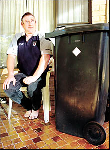 WHEELIE BIG BOMB: Goonellabah resident David Edwards and the garbage bin that became the centre of a police operation involving WHEELIE BIG BOMB: Goonellabah resident David Edwards and the garbage bin that became the centre of a police operation involving
