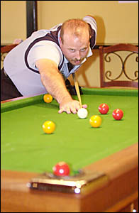 Byron Bay?s Damien Smith in action at the NSW Eight-ball Championships in Casino last weekend. Smith finished second. Byron Bay?s Damien Smith in action at the NSW Eight-ball Championships in Casino last weekend. Smith finished second.