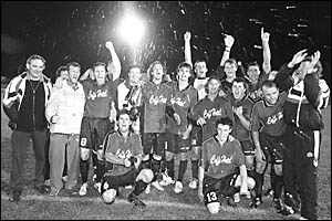 The joy of winning ... the Coffs United Lions celebrate their gritty win in style. The joy of winning ... the Coffs United Lions celebrate their gritty win in style.