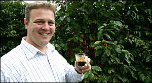 SWEET SUCCESS: Andrew Ford, general manager of Mountain Top Coffee at Nimbin, toasts the opening in Venice of an Italian market SWEET SUCCESS: Andrew Ford, general manager of Mountain Top Coffee at Nimbin, toasts the opening in Venice of an Italian market