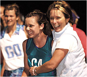 GOOD GIRL: Jasmine Lee gets a hug from her mum Susan after South Grafton High School defeated Grafton High in the open division GOOD GIRL: Jasmine Lee gets a hug from her mum Susan after South Grafton High School defeated Grafton High in the open division