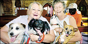ARMS FULL: Margaret Bryant, of Lismore, needed the help of her friend Kath Hall, of Lismore, to handle her dogs Wilson, Randy, ARMS FULL: Margaret Bryant, of Lismore, needed the help of her friend Kath Hall, of Lismore, to handle her dogs Wilson, Randy,
