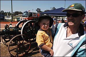 JOHN DWYER JUNIOR with John Dwyer at the tractor display. JOHN DWYER JUNIOR with John Dwyer at the tractor display.