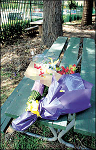IN MEMORY: Floral tributes left at the Brunswick Street entrance of Trinity Catholic College where on Monday a young boy died. IN MEMORY: Floral tributes left at the Brunswick Street entrance of Trinity Catholic College where on Monday a young boy died.
