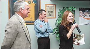 NRRA chairman, Bob Pavitt, left with Phil and Elizabeth Minter accepting the horse of the year award for their galloper Famous NRRA chairman, Bob Pavitt, left with Phil and Elizabeth Minter accepting the horse of the year award for their galloper Famous