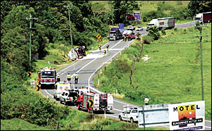 CRASH SCENE: The Pacific Highway, eight kilometres north of Ballina, where a petrol tanker yesterday overturned, spilling most CRASH SCENE: The Pacific Highway, eight kilometres north of Ballina, where a petrol tanker yesterday overturned, spilling most