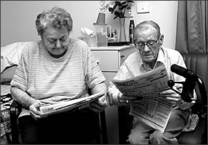 Serious business . . . Margaret and Jim Kelly study the form guide in the hope of picking the winner in the ?race that stops th Serious business . . . Margaret and Jim Kelly study the form guide in the hope of picking the winner in the ?race that stops th