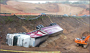 This B-Double landed in the middleof a highway construction site This B-Double landed in the middleof a highway construction site