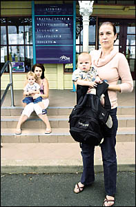 TRAVELLING BLUES: Lynelle Hotlby, holding five-month-old Jake, and the nappy bag which she was told was too big to take on a bu TRAVELLING BLUES: Lynelle Hotlby, holding five-month-old Jake, and the nappy bag which she was told was too big to take on a bu