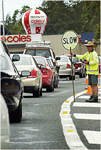 Work crews were busy at the Pacific Highway/Moonee Beach Road intersection yesterday but delays to the construction of nearby H Work crews were busy at the Pacific Highway/Moonee Beach Road intersection yesterday but delays to the construction of nearby H