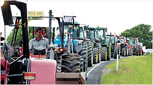 HEAVY TRAFFIC: Included in yesterday?s 15km/h convoy from St Helena to Ballina along the Pacific Highway were 18 tractors. HEAVY TRAFFIC: Included in yesterday?s 15km/h convoy from St Helena to Ballina along the Pacific Highway were 18 tractors.