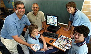 CHECKING out the new Kingscliff High School yearbook CD are (at back) teacher John Simons, students Daniel Cargill and Joshua A CHECKING out the new Kingscliff High School yearbook CD are (at back) teacher John Simons, students Daniel Cargill and Joshua A