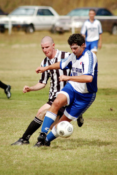 Gladstone United?s Graeme Turner (left) was named men?s best and fairest player for 2005. Gladstone United?s Graeme Turner (left) was named men?s best and fairest player for 2005.