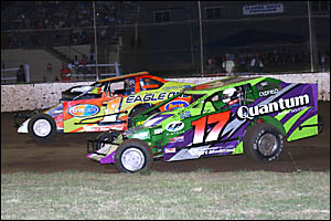 GOING FOR IT: Luke Oldfield and Mark Robinson tangle in the Mr Modified division of the last weekend?s speedway racing at Lismo GOING FOR IT: Luke Oldfield and Mark Robinson tangle in the Mr Modified division of the last weekend?s speedway racing at Lismo