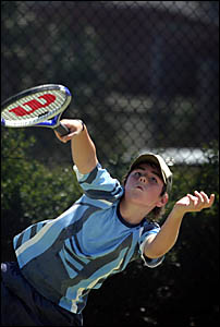 Rory Young in action in the final of the under-11s at the round-robin Playtennis Tournament at Casuarina Beach. Rory Young in action in the final of the under-11s at the round-robin Playtennis Tournament at Casuarina Beach.