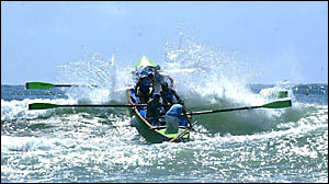 A Minnie Water-Wooli SLSC crew competes in the club?s boat before it was destroyed in a freak collision. A Minnie Water-Wooli SLSC crew competes in the club?s boat before it was destroyed in a freak collision.