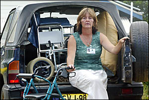 PALLIATIVE care volunteer Meredith Dennis with her not-so-trusty Suzuki Vitara loaded up with equipment. PALLIATIVE care volunteer Meredith Dennis with her not-so-trusty Suzuki Vitara loaded up with equipment.
