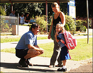 Five-year-old Grace Clark says goodbye to Mum (Yvette) and Dad (Darryl) before her first day of school yesterday. Five-year-old Grace Clark says goodbye to Mum (Yvette) and Dad (Darryl) before her first day of school yesterday.
