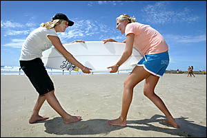 STEPHANIE Gilmore (above right) and Chelsea Georgeson going head-to-head in the Roxy Pro. STEPHANIE Gilmore (above right) and Chelsea Georgeson going head-to-head in the Roxy Pro.