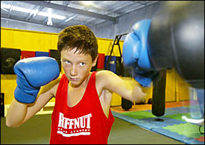 BILAMBIL?S Tommy Strain shapes up ahead of tomorrow night?s fights at Condong Bowling Club. BILAMBIL?S Tommy Strain shapes up ahead of tomorrow night?s fights at Condong Bowling Club.